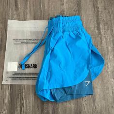 New Gymshark 2-In-1 Running Shorts. Size Xs Light Blue Moisture-wicking Bottoms For Summer, Blue Sporty Athletic Shorts For Beach Season, Blue Athleisure Bottoms For Beach Season, Sporty Light Blue Shorts For Beach, Blue Training Shorts For Summer, Light Blue Casual Training Bottoms, Casual Light Blue Shorts For Gym, Light Blue Sports Shorts For Summer, Light Blue Gym Shorts For Summer