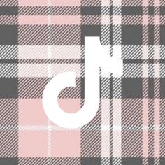 the letter j is made up of pink and grey plaid fabric with white letters on it