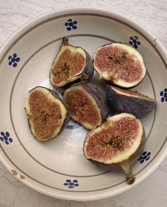 figs in a bowl on a table