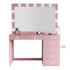 a pink vanity with lights on it