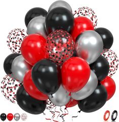 a bunch of black, silver and red balloons with confetti on the top