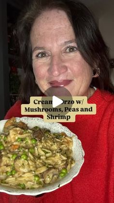 a woman holding a plate of food with the caption cream drizzle mushrooms peas and shrimp