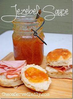 sandwiches and jam on a cutting board with the words jezebel sauce above them