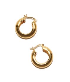 First, base. Shop our versatile medium-sized hoop earrings in gold or silver-tone-plated brass. Although classic in their own right, we recommend using these as the foundation for mixing, matching and layering charms from our best-selling Mood Hoops collection. An endless assortment of unique earring combinations awaits you! Shop our newest Mood Hoop Charms here. 100% 24K gold-plated brass or rhodium-plated brass 20mm diameter round hoops Ships in 1-3 days PLEASE NOTE: THIS PRODUCT IS NOT ELIGIB Gold-tone Classic Huggie Earrings For Everyday, Classic Small Hoop Huggie Earrings In Brass, Classic Brass Small Hoop Huggie Earrings, Nickel-free Classic Brass Hoop Earrings, Gold Rounded Earrings For Everyday, Everyday Gold-tone Round Huggie Earrings, Classic Brass Hoop Huggie Earrings, Classic Small Hoop Brass Earrings, Tarnish Resistant Rounded Earrings For Everyday