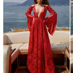 This Dress Will Reinvent The Modern Woman With Its Plunging Neckline, Voluminous Kimono Sleeves, And Braided Belt. Fitted At The Waist And Falling To An A-Line Silhouette, This Maxi Dress Is Rendered From A Patterned Satin Fabric In A Vibrant Red Red Maxi Dress, Red Maxi, Red Dress Maxi, Cape Sleeves, Kimono Sleeves, Braided Belt, Kimono Sleeve, Maxi Dress With Sleeves, Plunging Neckline