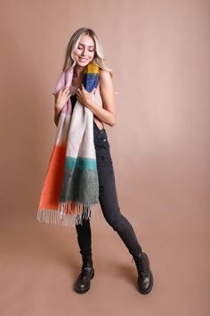 Who says you can't wear art? The Color Block Soft Faux Mohair Scarf is like a vibrant painting you can drape around your shoulders. Fashioned from 100% acrylic, it mimics the lush texture of mohair, all while being animal-friendly. Measuring a generous 82 inches by 14.5 inches with a 4.5-inch tassel, it's not just a scarf—it's a statement. Made from 100% acrylic. Mohair Scarf, Stocking Stuffers For Women, Color Block Scarf, Bachelorette Dress, Casual Bodysuit, Cozy Accessories, Rush Dresses, Chunky Scarves, Soft Scarf