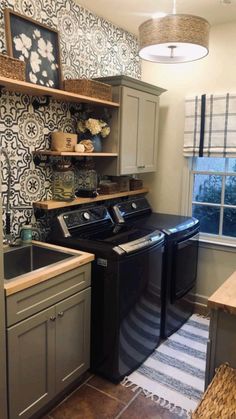 a washer and dryer in a small kitchen