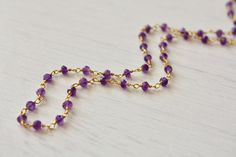 Amethyst Necklace, Purple Amethyst Beaded Chain, February Birthstone, Amethyst Rosary Chain, Dainty Minimalist Gold Chain, Mother's Day Gift Beaded purple amethyst rosary style necklace wire wrapped in 14k gold filled. Rondelles are 3mm in size. Necklace closes with lobster clasp. More Details about this Necklace: - Stone: Amethyst - Birthstone Month: February - Stone Size: 3mm - Necklace Length: Choice of 16 or 18 inches. We can customize this necklace to any length so please send us a message Lavender Beaded Chain Jewelry For Gifts, Amethyst Beaded Chain For Jewelry Making, Purple Amethyst Beaded Chain Jewelry, Spiritual Purple Necklace With Beaded Chain, February Stone, Amethyst Rosary, Rosary Style Necklace, Amethyst Birthstone, Necklace Stone