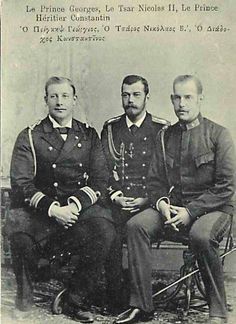 three men in uniforms are posing for a photo