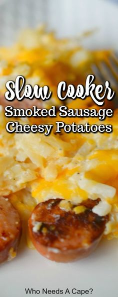 a close up of a plate of food with cheese and tomatoes on it that says slow cooker smoked sausage cheesy potatoes