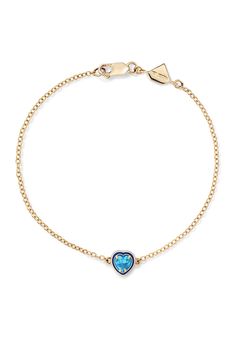 Add a pop of color to your wrists with our signature 14K Yellow Gold Heart-Shaped Cocktail Bracelet featuring colored enamel and lab-created gemstones. Due to the custom nature of this product, please allow 20 business days for production. These are final sale. Please note, this is sold as a single, complete earring. Stone & setting: 6.5mm, 6.5" total length, 14K Yellow Gold, Made in New York City Fine Jewelry: Blue Heart Charm, Blue Heart Charm Fine Jewelry, Blue Fine Jewelry With Heart Charm, Luxury Heart Cut Jewelry With Bezel Setting, Elegant Blue Bracelets For Valentine's Day, Luxury Blue Heart Pendant Jewelry, White Gold Heart-shaped Jewelry With Bezel Setting, Luxury Blue Jewelry For Valentine's Day, Heart Cut Gemstone Bracelets For Gifts