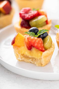 small fruit tarts on a white plate