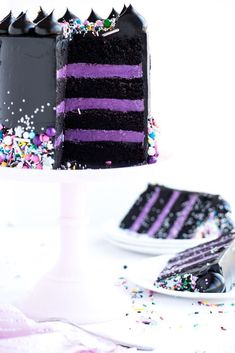 an image of a purple and black cake with sprinkles on the side