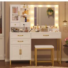 a white vanity with lights on it and a stool in front of the counter top