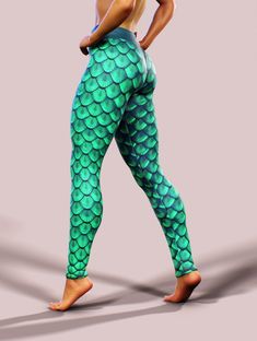 "Shop safely with Free DHL Express Shipping above $100! * Applicable for the US, Canada, and New Zealand orders over $80*  These mermaid yoga pants are handmade from a 4-way stretch fabric, printed in bright green colors.  The green scale leggings have an additional elastic in the V-shaped waistband and come with a double layer of fabric for additional support of the tummy area.  Why our products? - UV protection UPF 50+ ; - Shaping cut that lifts the booty; - Move smoothly with our all-way stretch fabric; - Breathable and light; - No more wet spots; - Squat proved. No transparency; - Original everchanging designs; Size Chart: XS . /  UK, AU, NZ 4 Bust: 84cm or 33 inch Waist: 64cm or 25.2 inch Hip: 88cm or 34.6 inch S .  / UK, AU, NZ 6-8 Bust: 88cm or 34.6 inch Waist: 68cm or 26.inch Hip: Mermaid Yoga Pants, Mermaid Costume Leggings, Green Yoga Leggings, Ariel Leggings, Leggings Mermaid, Mermaid Green, Mermaid Leggings, Activewear Print, Estilo Fitness