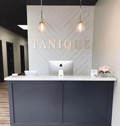 the front desk of tanquee is clean and ready for customers to use