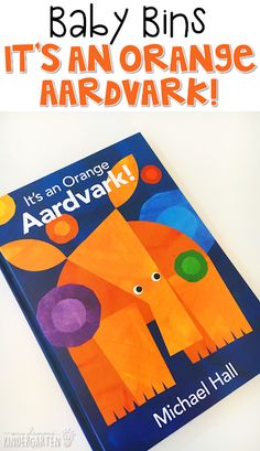 an orange and blue book with the title it's an orange aardvark