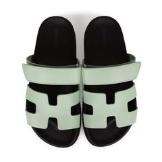 This pair of Cypre sandals are in Vert Jade Epsom and feature the iconic H and a velcro crossover strap. Origin: ItalyCondition: New and never wornAccompanied by: Hermes box, dustbags, ribbonSize: 37.5 EU Hermes Sandals, Hand Fashion, Hermes Box, Sandals White, Madison Avenue, Hermes Bags, Fashion 2020, Black Rubber, Brunei