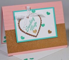 a card with a heart shaped cookie on it