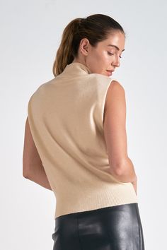 Sleek sophistication meets cozy comfort in the Chelcie sweater. This sleeveless mock turtleneck with textured piping details elevates your look for both work and play. Denim Dress Fall, Jumpsuit Coverup, Fall Bottoms, Cardigan Sweater Dress, Mock Neckline, Comfy Sweaters, Pinterest Fashion, Mock Turtleneck, Sleeveless Sweater