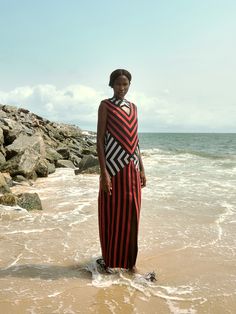 Exploring and celebrating Nigerian heritage, Fruché’s new collection makes a powerful, unapologetic statement. This maxi dress is cut from handwoven Aso-Oke cloth featuring bold geometric stripes that give the simple silhouette an ultra-cool contemporary feel. The skin-baring cutouts and front slit add a sprinkle of sex appeal, while the frayed raw hem reveals the brand's outstanding craftsmanship. Style yours with playful accessories to up the impact. - Round neck, cutouts, front slit, zip fast Creative Confidence, African Luxury, Aso Oke, Dresses Pants, Ankara Styles, Dresses Uk, Simple Elegance