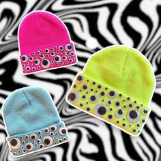 All eyes will surely be on you while rocking this beanie! Choose your color: neon pink, neon yellow, or neon blue! Decorated beautifully with real various sized googley eyes - and YES they do move! Such a fun statement piece made with love by us! This Disco Dolphin original piece cannot be found anywhere else! One size beanie fits most adult sized noggins! Brand new, no flaws but the eyeballs used and their arrangement will vary with each design! ✿ MATERIALS: 100% Acrylic Beanie made with plastic googley eyes! ✿ IMPERFECTIONS: Brand new, no flaws! Made to order, so eyeball arrangement will vary per beanie! ✿ MEASUREMENTS: Standard size beanie - one size fits most adult noggins! ✿ RETURNS//EXCHANGES: All orders are final and non refundable, returnable or exchangeable. ✿ SHIPPING: Typically Adjustable Fun Style Beanie Cap, Funky Beanie Hats, Funky Adjustable Beanie Hat, Novelty One Size Fits Most Cap Beanie, Quirky Beanie For Winter, Adjustable Novelty Beanie Cap, Handmade Novelty Crochet Beanie Hat, Weird Hats, Unique Beanies