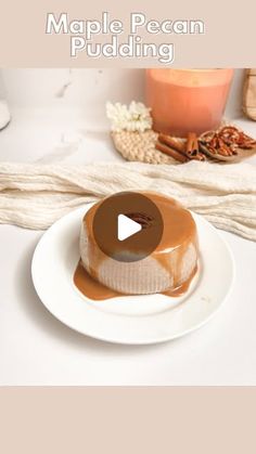 an image of a cake on a plate with the title maple pecan pudding over it