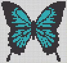 a cross stitch butterfly pattern with blue and black wings on it's back side