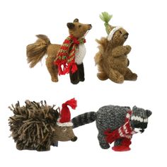 four small knitted animals with hats and scarves