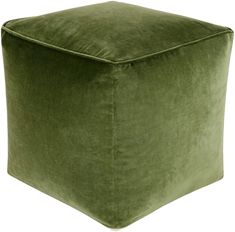 a square green velvet ottoman sitting on top of a white floor