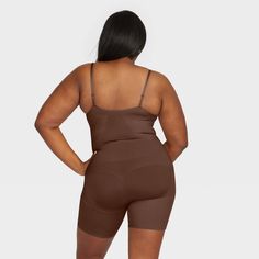 Talk about three for one! This open-bust bodysuit uses breathable, comfortable compression to tone the tummy and hips, and give you a perky rear view. Best of all? The full-coverage design is made from soft, cling-free fabric for additional comfort and is also seamless for invisible layering under your clothes. Seamless Second-skin Underwire Shapewear, Seamless Brown Shapewear, Fitted Seamless Brown Shapewear, Seamless Full Coverage Second-skin Shapewear, Seamless Second-skin Shapewear In Elastane, Stretch Nylon Shapewear, Short Length, Fitted Seamless Brown Bodysuit, Solid Compression Shapewear, Short Length, Chestnut Brown