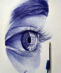 a pencil drawing of an eye with long lashes and blue eyeshade is shown