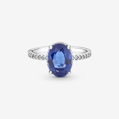 Sparkling Statement Halo Ring | Sterling silver | Pandora US Jewelry Chain Types, Blue Stones Jewelry, Jewelry Making Rings, Blue Stone Ring, Party Necklace, Ring Fit, Halo Ring, Ring Size Guide, The Band