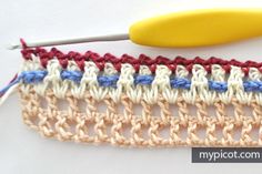 the crochet stitch is being worked on