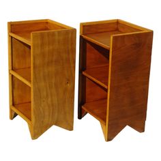 two wooden shelves sitting next to each other