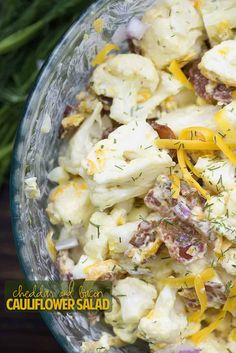 a bowl filled with cauliflower and cheese