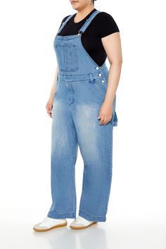 Forever 21+ - Crafted from non - stretch denim, this pair of overalls features a stone wash, adjustable straps, square - cut neckline, bib pocket, buttoned sides, belt loops, slanted front pockets, mock zip fly, wide leg, and back patch pockets with utility straps. | 100% cotton | Machine wash cold | Model is 5'7" and wearing a Size 1X | Utility Denim Overalls Medium Wash Denim Jumpsuit With Adjustable Straps, Medium Wash Denim Jeans With Suspenders, Denim Jumpsuit With Suspenders, Medium Wash Denim Jumpsuit With Suspenders And Bib Front, Denim Overalls With Adjustable Straps, Denim Bib Front Bottoms With Adjustable Straps, Back Patch, Denim Overalls, Square Cut