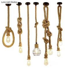 several rope lights hanging from the ceiling with bulbs on each end and one light bulb attached to