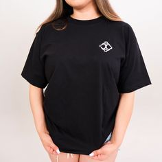 The Charming Misfit Crew Tee is all about comfort and style. Available in black and beige, this heavy-weight, 100% cotton tee has a slightly oversized fit that’s perfect for a relaxed, everyday look. Materials: 18/1 100% Cotton (Heavy Weight) Made in the USA Black And Beige, Made In The Usa, Heavy Weight, Everyday Look, Black Tee, Cotton Tee, The 100, Black