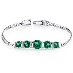 What Emerald dreams are made of This Emerald bracelet is an enchantingly easy-to-wear shade of green, blurring the lines between reality and dreams. This standout bracelet features round shape Peora simulated Emerald gemstones in .925 sterling silver. Technically crafted and cut for optimum brilliance, our simulated Emerald gemstones are optically identical to their mined counterparts, but they are made using alternative materials. We're big fans of eco-luxury. Handcrafted in pure .925 sterling silver goodness, this bracelet has been carefully coated in an elegant rhodium finish. Our artisans are expertly trained in this process which fortifies the bracelet's strength, shine and brilliance. Looking to treat yourself, just because? We're all for that. Our concierge stylists are here to help Green Stone Bracelet, Emerald Bracelet, Fine Silver Jewelry, Emerald Jewelry, Emerald Gemstone, Bracelet Jewelry, Green Stone, Stone Bracelet, Beautiful Bracelet