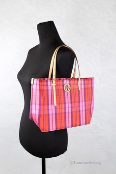 Style: Tory Burch (146732) Emerson Small Pink Red East West Market Tote Handbag Material: Mesh and Leather Features: Inner Slip Pocket, Zip Closure, Adjustable Straps Measures: 11" L x 9.5" H x 4"D Pink Tote Beach Bag With Adjustable Strap, Tory Burch Market Tote, Pink Mcm Tote Bag, Tory Burch Red Bag, Tory Burch Shopping Bag, Black Satchel, East West, Market Tote, Michael Kors Jet Set