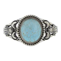 "This boldly designed cuff is unique and handmade by Mary Ann Spencer. It features the style of Southwestern Jewelry. The focal point of this heavy-gauge women's silver cuff bracelet is the Number 8 Turquoise. Number 8 Turquoise comes from a great classic American Turquoise mine. This amazing Turquoise is a true light blue and features brown spider web matrix patterns. This gemstone is set into the fancy hand stamped and filed style Sterling Silver bezel and surrounded by a hammered silver desig Western Turquoise Bangle Cuff Bracelet, Western Style Turquoise Bangle Cuff Bracelet, Western Style Blue Cuff Bangle Bracelet, Southwestern Turquoise Bangle, Western Style Blue Bangle Jewelry, Western Turquoise Bracelet With Concho, Western Style Turquoise Bracelet With Concho, Western Turquoise Bracelets With Concho, Adjustable Southwestern Blue Cuff Bracelet