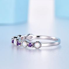 This is a very unique opal & amethyst gold wedding band. Stone: *2.5mm Lab-created opal and 2.2mm natural amethyst. Custom Order *The main stone can be other gemstones you can imagine,any birthstone can be made.Please contact me if you need this service. *Any size *I can also design the matching band. Other *Rush order *Engraving *Payment plans *Please feel free to contact me if you need the above service. Processing Time *Handmade jewelry normally needs 2-3 weeks to finish,For some special Personalized Gold Rings, Birthstone Band, Gold Wrap Ring, Opal Wedding Band, Unique Opal, Silver Wrap Ring, Opal Wedding, Black Wedding Rings, Gold Rings Simple