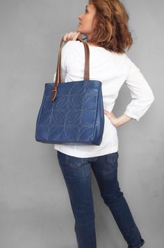 Leather tote bag. Blue leather tote. Tote bag leather. Artisan Blue Leather Bag, Blue Leather Tote Shoulder Bag, Blue Leather Bag With Leather Trim, Blue Leather Bags With Logo, Blue Leather-lined Tote Shoulder Bag, Embroidered Leather, Tote Bag Leather, Leather Tote Bag, Blue Bags