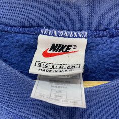 PLEASE ASK ANY QUESTION BEFORE BUYING THIS IS USED CLOTHING PLEASE DONT EXPECTED IT TO BE LIKE NEW OR IN PRISTINE CONDITION Vintage 90s NIKE Sweatshirt Swoosh Small Logo Blue Colour Crewneck Sportswear Hip Hop Sweater Clothing Size Small tag nike material cotton 95% polyester 5% saiz on tag S (Small) Mesasures About ( Approximately) -Armpit to Ampit : updated inch -Length (back collar down) : updated inch Condition : used good condition 8/10 **No Tears No Stains And No Hole** 🎈PLEASE READ THE D Navy Blue Nike Crewneck, 90s Nike Sweatshirt, Nike Blue Cotton Sweatshirt, Blue Vintage Nike Sweatshirt, 90s Blue Sweatshirt For Sports, 90s Crew Neck Sports Sweatshirt, 90s Nike, Nike Sweatshirt, Nike Sweatshirts