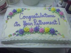 a sheet cake with flowers on it that says congratulations in your retirement written on the frosting