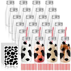 there are many bottles with straws in them and one has a cow print on it