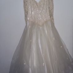 Beautiful Beaded Wedding Dress Size 16 Length Fits A 5 Foot 5 1/2 Inch Person With A 1 1/2 Inch Heal But Still A Bit Too Long. Side Panels On Dress Could Be Removed To Make It Smaller. Let Your Fairy Tale Begin With This Dress. Embellished Lace Mother Of The Bride Dress, Wedding Dresses With Beaded Straps And Sweetheart Neckline, Elegant Sequined Wedding Dress For Debutante Ball, Sequin Lace Mother Of The Bride Dress For Wedding, Sequin Wedding Dress With Fitted Bodice, Embellished Lace Wedding Dress For Prom, Embellished Sweetheart Neckline Wedding Dress, Wedding Gown With Beaded Straps, Wedding Evening Dress With Beaded Straps