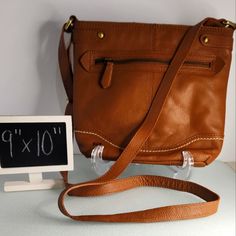 This Is A Nwot Born Izabel Pebbled Tan Leather Bucket Crossbody Bag I'm Pristine Condition With No Flaws, Blemishes, Or Visible Wear Tan Crossbody Shoulder Bag With Phone Pocket, Tan Crossbody Shoulder Bag For Everyday Use, Tan Soft Leather Crossbody Shoulder Bag, Casual Tan Crossbody Shoulder Bag, Casual Tan Soft Leather Bag, Plastic Bag Crochet, Women Crossbody Bag, Leather Bucket, Plastic Bag