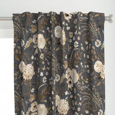 a curtain with flowers and leaves on it